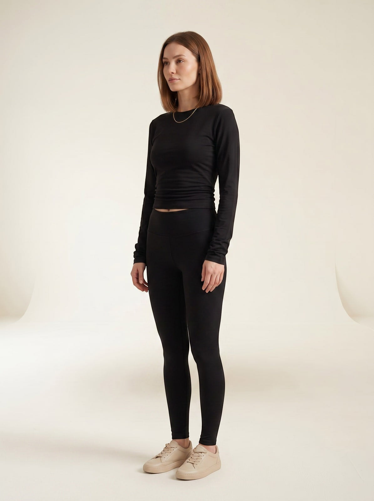 Joubify black long sleeve jersey top with ruching and round neck worn with black leggings